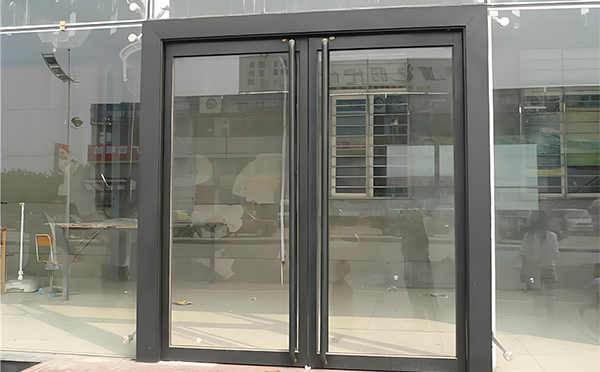 山丹玻璃地弹门